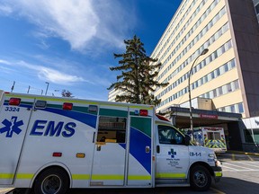 Ambulances parked at the emergency entrance of Foothills Medical Centre on Sept. 24, 2021.