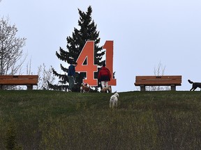 Edmonton Oilers goalie Mike Smith has his number large then life displayed on top of the hill at the Belgravia off leash dog park in Edmonton, May 10, 2022.