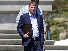 Justice Minister Tyler Shandro leaves the Alberta legislature on May 31, 2022. An Aug. 8, 2022, sit-down between Shandro and members of four Alberta legal aid lawyers' groups failed to end a partial job action over legal aid funding.