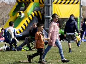 Edmontonians celebrate the Eid Al Fitr with a carnival hosted by MAC Islamic Centre - Rahma Mosque, in Edmonton's Collingwood Park Monday May 2, 2022. Eid al-Fitr is celebrated to commemorate the end of the fasting month of Ramadan. Eid al-Fitr means "the celebration of breaking the fast." Photo By David Bloom