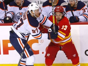 Calgary Flames Johnny Gaudreau battles Edmonton Oilers Connor McDavid in second period action during Round two of the Western Conference finals at the Scotiabank Saddledome in Calgary on Friday, May 20, 2022.