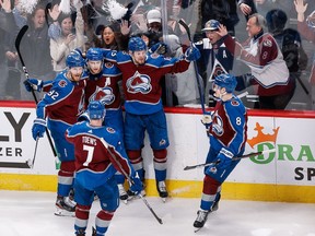 May 31, 2022; Denver, Colorado, USA; Colorado Avalanche center Nathan MacKinnon (29) celebrates his goal with left wing Gabriel Landeskog (92) and right wing Valeri Nichushkin (13) and defenseman Cale Makar (8) and defenseman Devon Toews (7) in the first period against the Edmonton Oilers in game one of the Western Conference Final of the 2022 Stanley Cup Playoffs at Ball Arena.