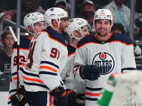 Edmonton Oilers center Ryan Nugent-Hopkins (93), left winger Evander Kane (91) and quarterback Cody Ceci (5) celebrate after a goal against the LA Kings in the third period of Game Three of the Stanley Playoffs first round Cup 2022 at Crypto.com Arena.