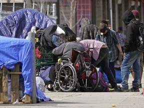 A homeless encampment on 106 Avenue near 99 Street in downtown Edmonton on Friday April 22, 2022.