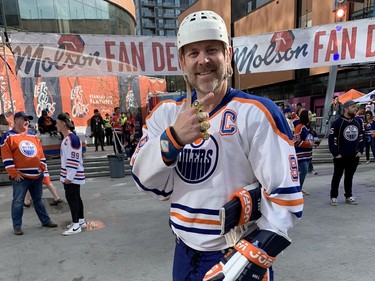 Jay Watson was in the crowd at Ice District Plaza Tuesday night fully outfitted just like Wayne Gretzky himself, with a retro blue and orange #99 jersey, helmet, pads and hockey skates with the blades removed.