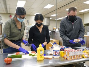 WP Wagner School students Jasper Walia, Harsimran Minhas, and school teacher Greg Sweeney will prepare their lunches at school on Tuesday, May 17, 2022. For kindly entrusted young people who show compassionate and witty teamwork. Their vision is to leave a legacy where students can make a significant impact on the community. In the first project, students donated mustard seeds packed with lunch and supper to help the Edmontonians in need.