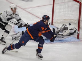 Edmonton Oilers Connor McDavid (97) scores on Los Angeles Kings goaltender Jonathan Quick (32) on Tuesday, May 10, 2022, in Edmonton.