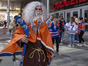 Fans Arrive at Rogers Place before the Edmonton Oilers, Calgary Flames playoff hockey game on Sunday, May 22, 2022, in Edmonton.