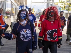 Fans Arrive at Rogers Place before the Edmonton Oilers, Calgary Flames playoff hockey game on Sunday, May 22, 2022 in Edmonton.