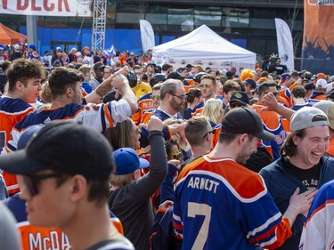 Fans gather in the plaza before the Edmonton Oilers, Calgary Flames playoff hockey game on Sunday, May 22, 2022 in Edmonton.