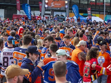 Fans gather in the plaza before the Edmonton Oilers, Calgary Flames playoff hockey game on Sunday, May 22, 2022 in Edmonton.