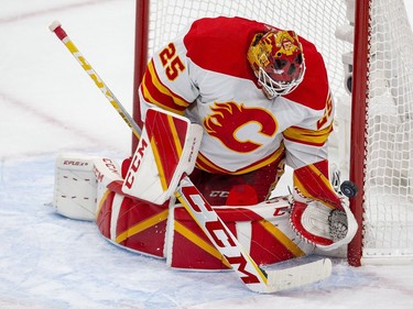 Calgary Flames goaltender Jacob Markstrom (25) makes a save against the Edmonton Oilers during first period NHL second round playoff hockey action on Sunday, May 22, 2022 in Edmonton.