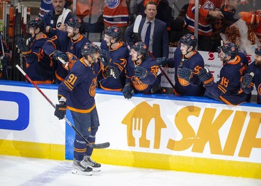 Edmonton Oilers Evander Kane (91) celebrates his second goal of the period with teammates against the Calgary Flames during second period NHL second round playoff hockey action on Sunday, May 22, 2022 in Edmonton.