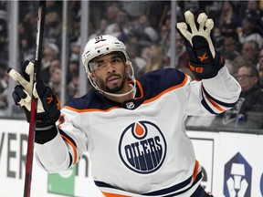 Edmonton Oilers left wing Evander Kane gestures after scoring an empty net goal during the third period in Game 6 of an NHL hockey Stanley Cup first-round playoff series against the Los Angeles Kings Thursday, May 12, 2022, in Los Angeles.