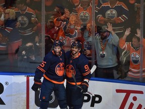 Edmonton Oilers Evander Kane (91) celebrates his goal with Darnell Nurse (25) against the Calgary Flames during NHL playoff action at Rogers Place in Edmonton, May 24, 2022.