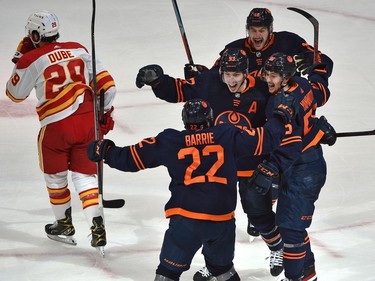 Edmonton Oilers Ryan Nugent-Hopkins (93) celebrates his go ahead goal with teammates against the Calgary Flames during NHL playoff action at Rogers Place in Edmonton, May 24, 2022.