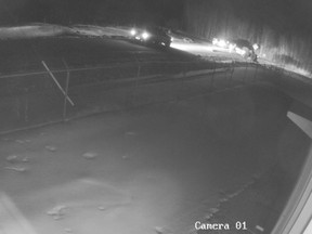 A frame from a security camera showing the March 27, 2020 altercation on a rural road outside Glendon, Alta., that resulted in the shooting deaths of Jacob Sansom, 39, and his uncle Maurice Cardinal. Roger Bilodeau and his son Anthony Bilodeau are on trial for second-degree murder in their deaths.