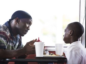 Mahershala Ali and Alex R. Hibbert in Moonlight, playing Thursday at AGA.