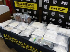 Two Alberta men have been charged with drug trafficking offences after a an eight month investigation that also netted a shotgun, meth, cocaine, cannabis, fentanyl, contraband tobacco and cash. 2022
Photo courtesy of ALERT