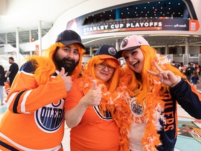 (left to right) Edmonton Oilers fans Brett Thompson, Claudette Schchuk, Amy Schchuk share their best team spirit for Game 2 of the Western Conference Stanley Cup Playoff vs. Colorado Avalanche during a watch party at Rogers Place in Edmonton on Thursday, June appeared. 2, 2022.