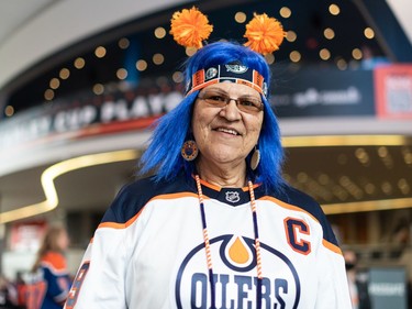Edmonton Oilers fan Brenda Goodswimmer, nicknamed "Supergran," dressed in her finest Oilers gear to attend Game 4 of the Western Conference Final versus the Colorado Avalanche in Edmonton, on Monday, Nov. 6, 2022. Goodswimmer drove four hours from Sturgeon Lake Cree Nation to see the game.