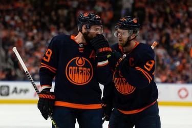 Edmonton Oilers' Connor McDavid (97) chats with Leon Draisaitl (29) as they play the Colorado Avalanche during first period of Game 4 of the NHL Western Conference Final action at Rogers Place in Edmonton, on Monday, June 6, 2022.