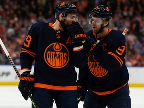 Edmonton Oilers' Connor McDavid (97) chats with Leon Draisaitl (29) as they play the Colorado Avalanche during first period of Game 4 of the NHL Western Conference Final action at Rogers Place in Edmonton, on Monday, June 6, 2022.