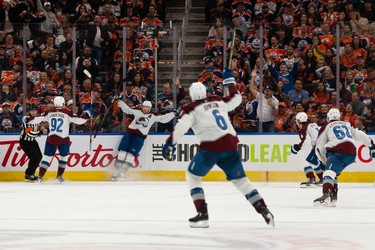 Colorado Avalanche's Nathan MacKinnon (29) celebrates a goal with teammates on Edmonton Oilers' goaltender Mike Smith (41) during third period of Game 4 of the NHL Western Conference Final action at Rogers Place in Edmonton, on Monday, June 6, 2022.