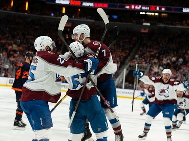 Colorado Avalanche's Artturi Lehkonen (62) celebrates his game winning goal wtih teammates on Edmonton Oilers' goaltender Mike Smith (41) during the overtime period of Game 4 of the NHL Western Conference Final action at Rogers Place in Edmonton, on Monday, June 6, 2022.
