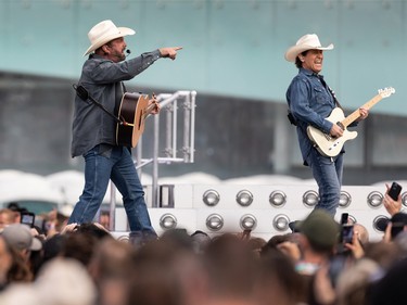 Garth Brooks (left) performs a sold out show at Commonwealth Stadium in Edmonton, on Friday, June 24, 2022.