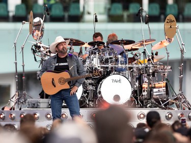 Garth Brooks (left) performs a sold out show at Commonwealth Stadium in Edmonton, on Friday, June 24, 2022.
