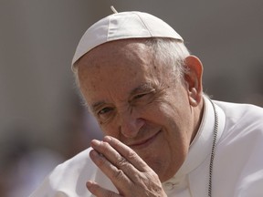 Pope Francis arrives to attend his weekly general audience in St. Peter's Square at the Vatican, Wednesday, June 22, 2022. The Vatican has released the program for Pope Francis' visit to Canada next month, which includes a visit to the site of a former residential school in Alberta with survivors of the institutions.