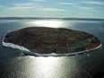 The 1.3 square kilometre Hans Island. One side will be Canadian, and the other side will be under the control of Denmark.