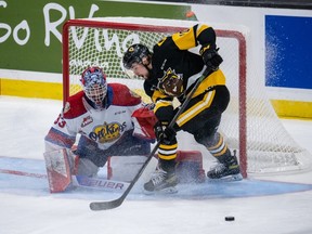 Sebastian Cossa (33) of the Edmonton Oil Kings makes the save against Gavin White (10) of the Hamilton Bulldogs at the 2022 Memorial Cup on June 24, 2022, at Harbour Station in Saint John, NB.