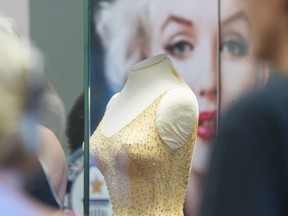 REGINA, SASK : July 16, 2017 - People queue to see the World's Most Famous Dress, the dress Marilyn Monroe wore at John F. Kennedy’s 45th birthday celebration at Madison Square Garden where she breathlessly sang “Happy Birthday, Mr.President”. The dress is owned by Ripley’s Entertainment, a division of the Jim Pattison Group – which also owns Save-On-Foods.
