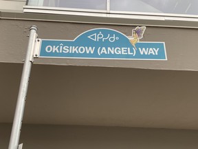 The street blade of Okîsikow Way, formerly 101A Avenue between 96 Street and 97 Street, was designed by artist Gloria Neapetung.