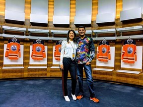 Ashif Mawji and his wife Zainul in the Oilers locker room.  