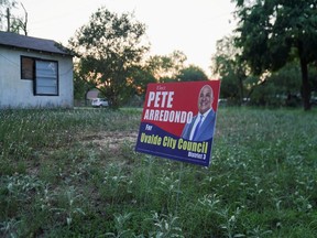 Political signs for Pete Arredondo, the Uvalde School District police chief, who is scheduled to be sworn in with the Uvalde City Council are seen in Uvalde, Texas, U.S. May 29, 2022.