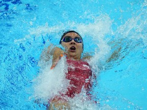 Kylie Masse of Canada competes during her women's 100m backstroke heat at the 19th FINA World Championships in Budapest, Hungary, Sunday, June 19, 2022.