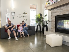 Gary and Pam McClenaghan visit the Chappelle Gardens Residents Association with their children, son Brooks, 8, and daughter Rylee, 5.