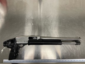 Edmonton police have arrested a 28-year-old man with a lifetime firearms prohibition after a 12-gauge shotgun was found in a vehicle on Monday, June 27, 2022.