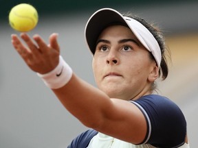 Canada's Bianca Andreescu serves against Belinda Bencic of Switzerland during their second round match at the French Open tennis tournament in Roland Garros stadium in Paris, France, Wednesday, May 25, 2022.