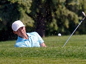 Lorens Chan from Honolulu, Hawaii hits a ball out of a sand trap during the first round of the ATB Classic on the PGA Tour Canada that was held at the Edmonton Petroleum Golf & Country Club on Thursday, June 15, 2022.