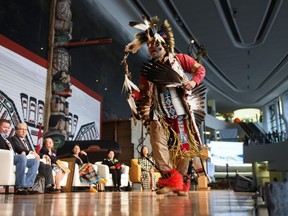Traditional dancer Awema Tendesi dances during an endorsement ceremony for the Indigenous Peoples Economic and Trade Cooperation Arrangement (IPETCA) at the Museum of History in Gatineau, Que., On Thursday, June 23, 2022. & nbsp; International Trade Minister Mary Ng says she wants Indigenous people - as the founders of trade in Canada - to benefit more from global free trade agreements.