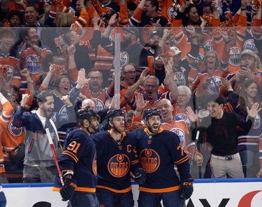 Edmonton Oilers' Evander Kane (91), Connor McDavid (97) and Evan Bouchard (75) celebrate a goal against the Colorado Avalanche during Game 3 of the Western Conference Final at Rogers Place, in Edmonton Saturday June 4, 2022.