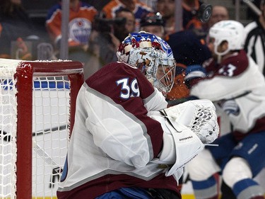 An Edmonton Oilers' shot goes off the mask of Colorado Avalanche's goalie Pavel Francouz (39) during Game 3 of the Western Conference Final at Rogers Place, in Edmonton Saturday June 4, 2022.