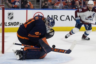 Edmonton Oilers' goalie Mike Smith (41) makes a save against the Colorado Avalanche during Game 3 of the Western Conference Final at Rogers Place, in Edmonton Saturday June 4, 2022.