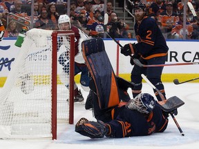 Edmonton Oilers' goalie Mike Smith (41) makes a sprawling save against the Colorado Avalanche during Game 3 of the Western Conference Final at Rogers Place, in Edmonton Saturday June 4, 2022. Photo By David Bloom