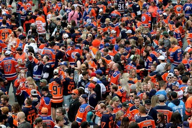 Edmonton Oilers fans wait for the start of Game 3 of the Western Conference Final against the Colorado Avalanche, outside Rogers Place in Edmonton, Saturday, June 4, 2022.
