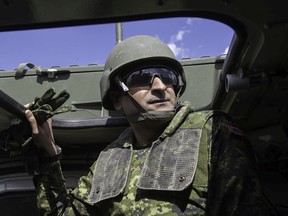 Ashif Mawji has helped many local charities and has been recognized and honored in many ways.  One time he really enjoys is being in the field as an honorary colonel of the Canadian Army's 20th Field Artillery Regiment.
